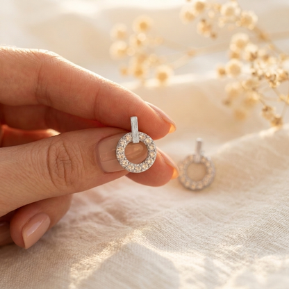 7 Days of Sparkle Silver Set – Starburst Pave Stud in silver held in hand