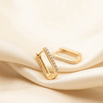 Gold Pave Rectangle Hoop Earrings flat lay on ceramic plate